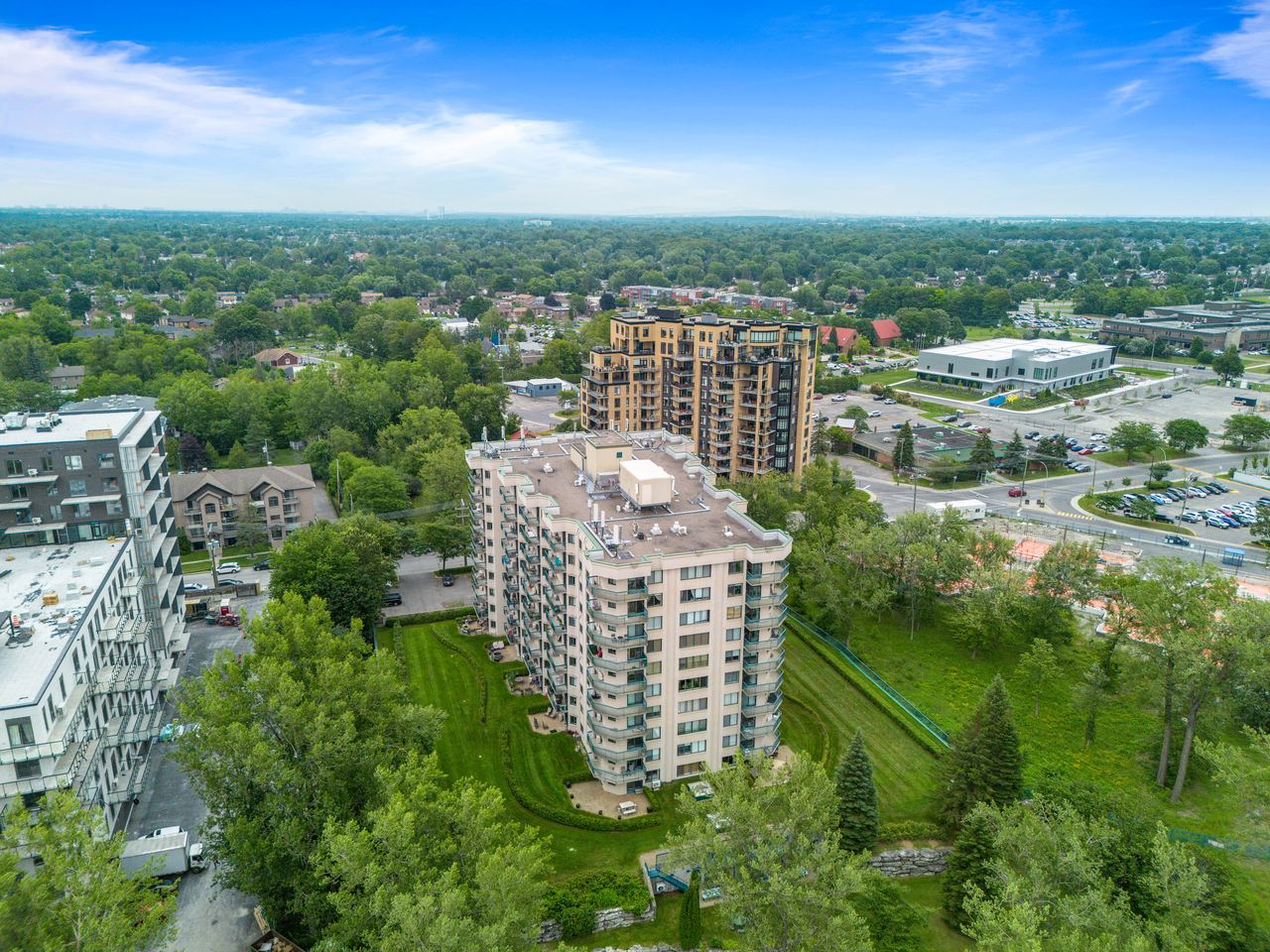 Drone aerial, condo tower, by SharpShot Media