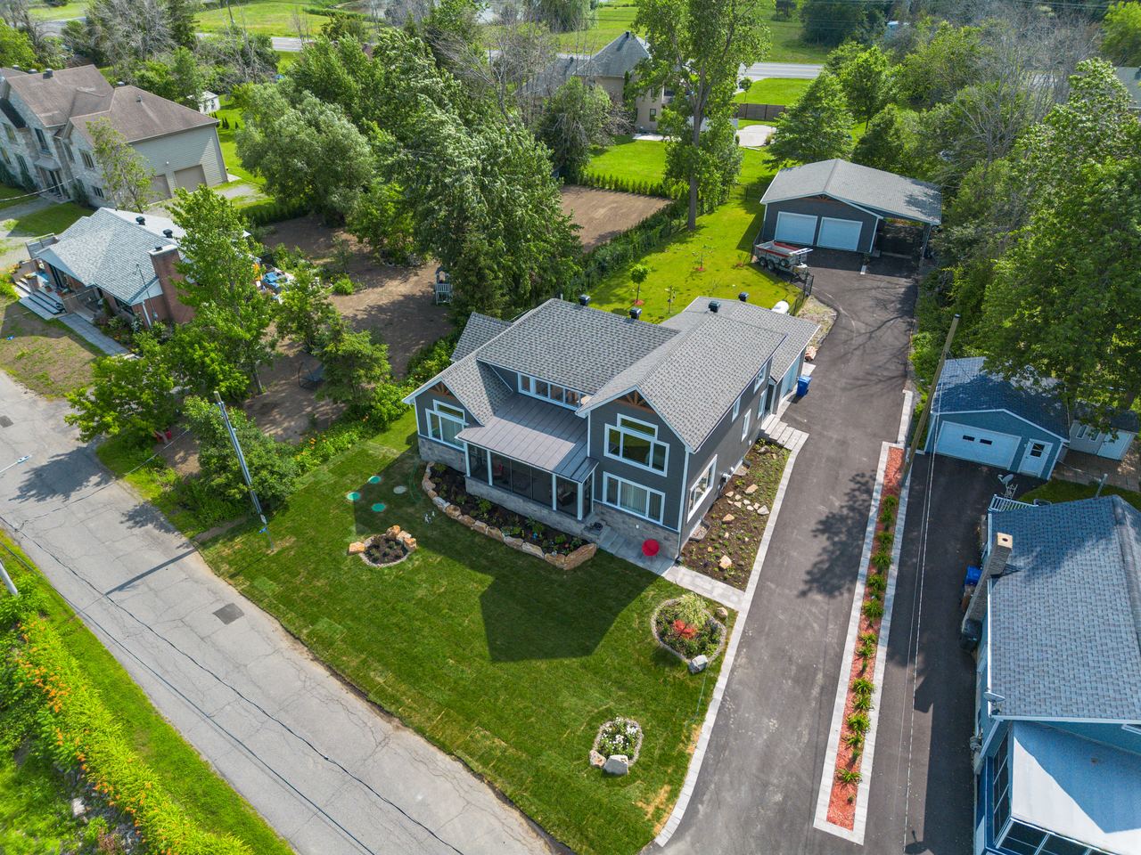 Drone aerial, lake-view home, by SharpShot Media